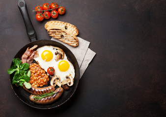 English breakfast. Fried eggs, sausages, bacon