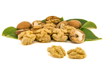 walnut macro isolate on a white background. Peeled nuts and shell close-up macro.