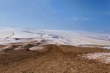Road with snow in winter season at Olkhon Island