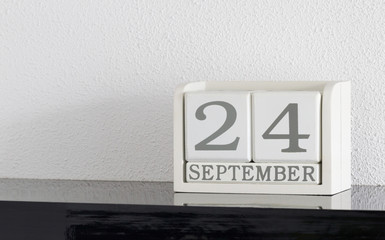 White block calendar present date 24 and month September