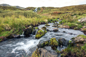 Naklejka na ściany i meble A small stream in the Scottish highlands