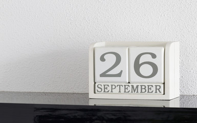White block calendar present date 26 and month September