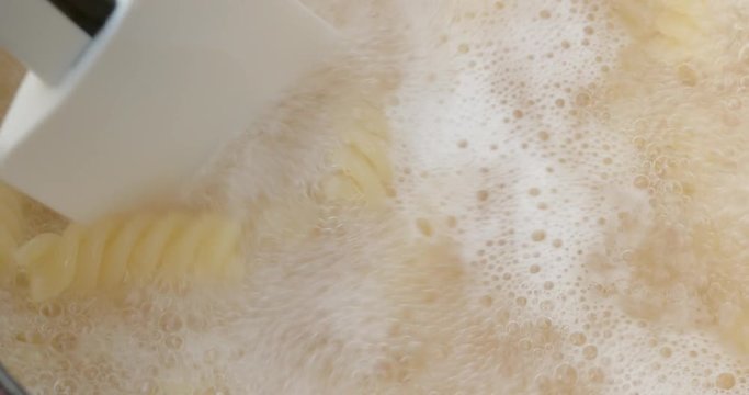 Cooking Fusilli in bowl