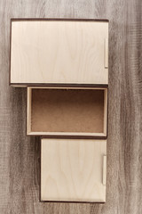 Top view of modern handmade wooden storage boxes