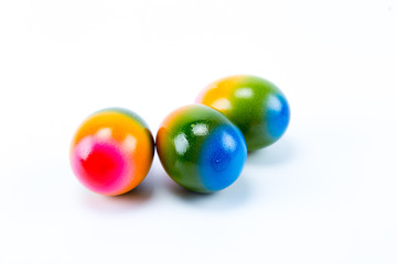 Colorful rainbow hand painted easter eggs with white background