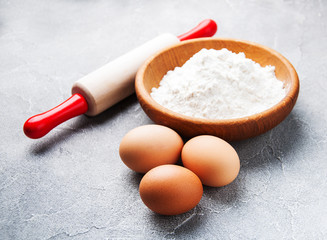 Baking ingredients - flour, eggs and pin