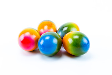 Colorful group of hand painted easter eggs with white background