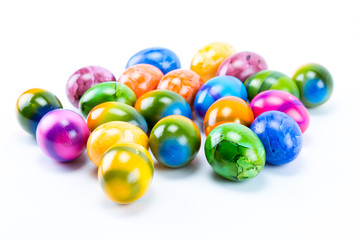 Colorful chicken hand painted easter eggs with white background