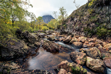 A stream flows through the rocks on the Isle of SKye