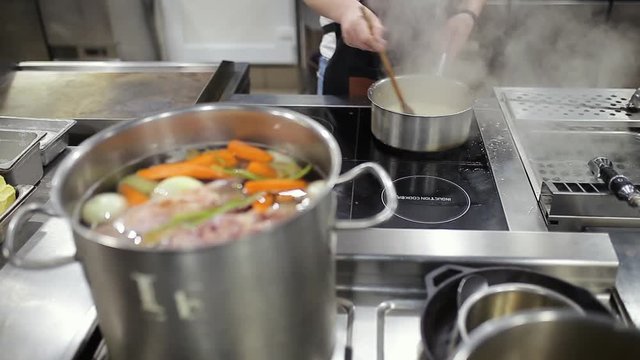 The process of cooking in the restaurant kitchen