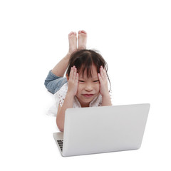 Cute little girl using tablet computer