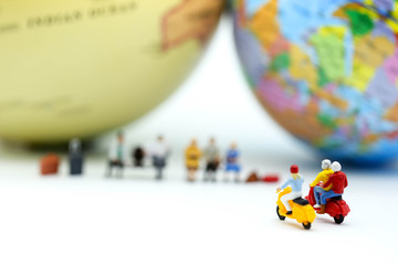 Miniature people : traveler  with world map, backpack and travel concept.