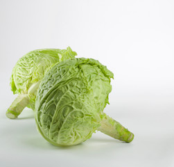 two  fresh cabbage isolated on white background