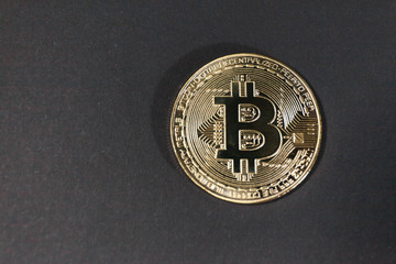 Bitcoin close up on black background