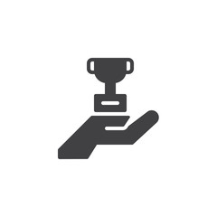 Hand holding trophy cup vector icon. filled flat sign for mobile concept and web design. Achievement simple solid icon. Symbol, logo illustration. Pixel perfect vector graphics