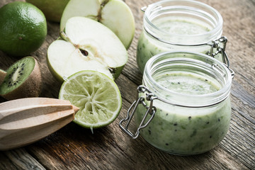 Green fruit smoothie with apple,kiwi, and lime , healthy lifestyle