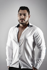 Fototapeta premium Sexy man Fashion Model with shirt and athletic body