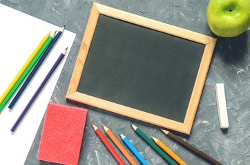 concept with stationery supplies for teacher's day, top view with copy space
