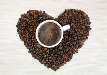 Coffee beans heart. Cup of coffee.