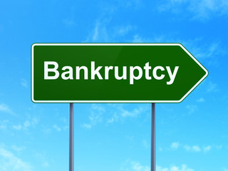 Law concept: Bankruptcy on green road highway sign, clear blue sky background, 3D rendering