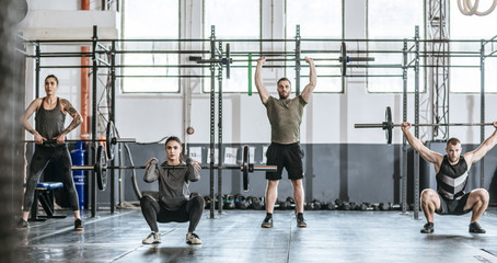 People Doing Workouts at Gym
