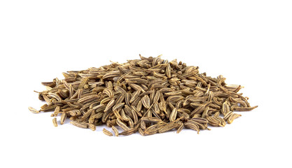 Cumin seeds or caraway isolated on white background