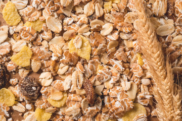 Oatmeal flakes as background. Healthy breakfast concept.