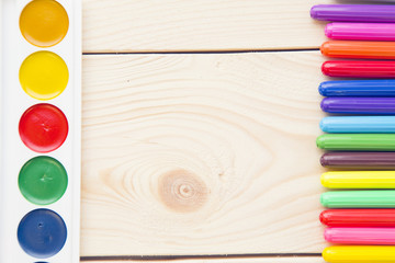 Notepad with pencils and colorfull markers