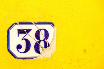 numerical tile on a stone wall background