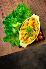 macaroni and cheese homemade food,pasta with mozzarella cheese,food styling on table.