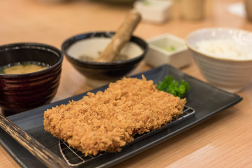 Top view Close up of Tonkatsu is a Japanese dish which consists of a breaded, deep fried pork cutlet