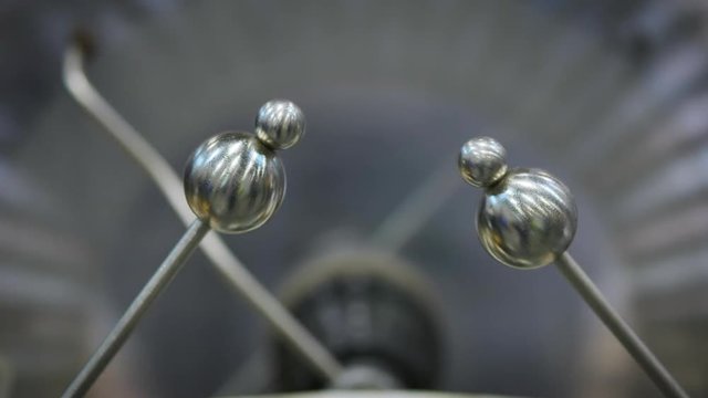 Electrostatic machine produces Electric spark. Slow motion.