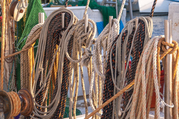 Closeup of coiled ropes on a commercial fishing boat