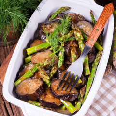 Eggplant casserole with green asparagus