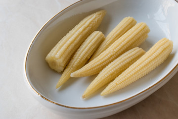 Sweet Baby Corn Pickle in Porcelain Bowl.