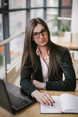 stylish and young girl at work