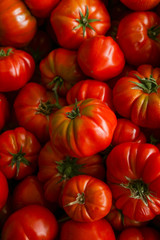 
Crates of fresh tomatoes on farmers market
