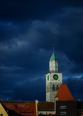Dark clouds arise over a catholic church