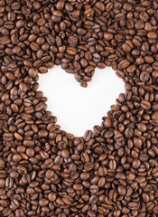 Heart made inside coffee beans