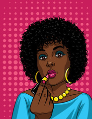 Colorful illustration in pop art style of beautiful african american girl doing makeup . Fashionable woman holding lipstick in her hand over  pink halftone dot background