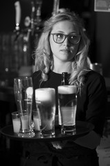 blonde waitress with a tray