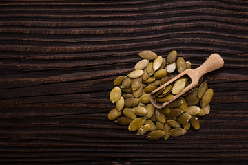 pumpkin seed oil on a rustic background