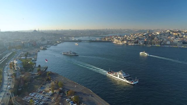 Ships floating Bosphorus blue water sunny day. Aerial drone view on sunset in Istanbul, Turkey