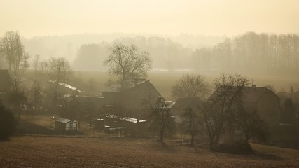 Fototapeta premium Village in the morning fog