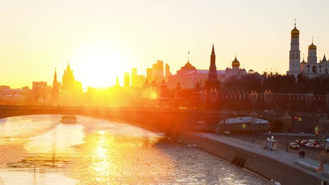 Moscow, Russia. Aerial view of popular landmark Kremlin in Moscow, Russia at sunset. Frozen Moscow river. Time-lapse at sunset. Zoom in