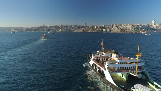 Ships floating Bosphorus blue water sunny day. Aerial drone view on sunset in Istanbul, Turkey