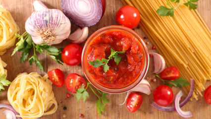 tomato sauce and raw pasta