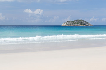 Fototapeta na wymiar A beach on the Seychelles island with white sand and stones