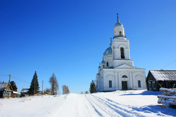 Winter road to the Christian church