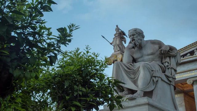 classical statue of Socrates from side with athena statue above